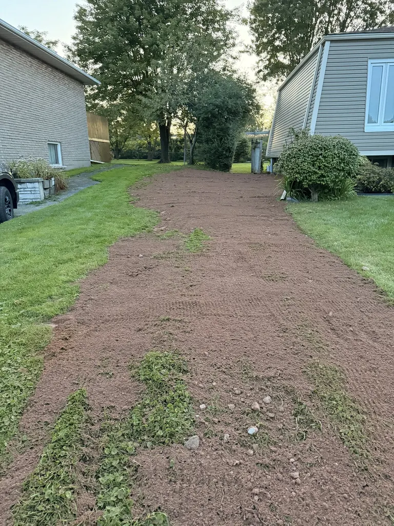 Side-yard laneway graded and ready for finishing